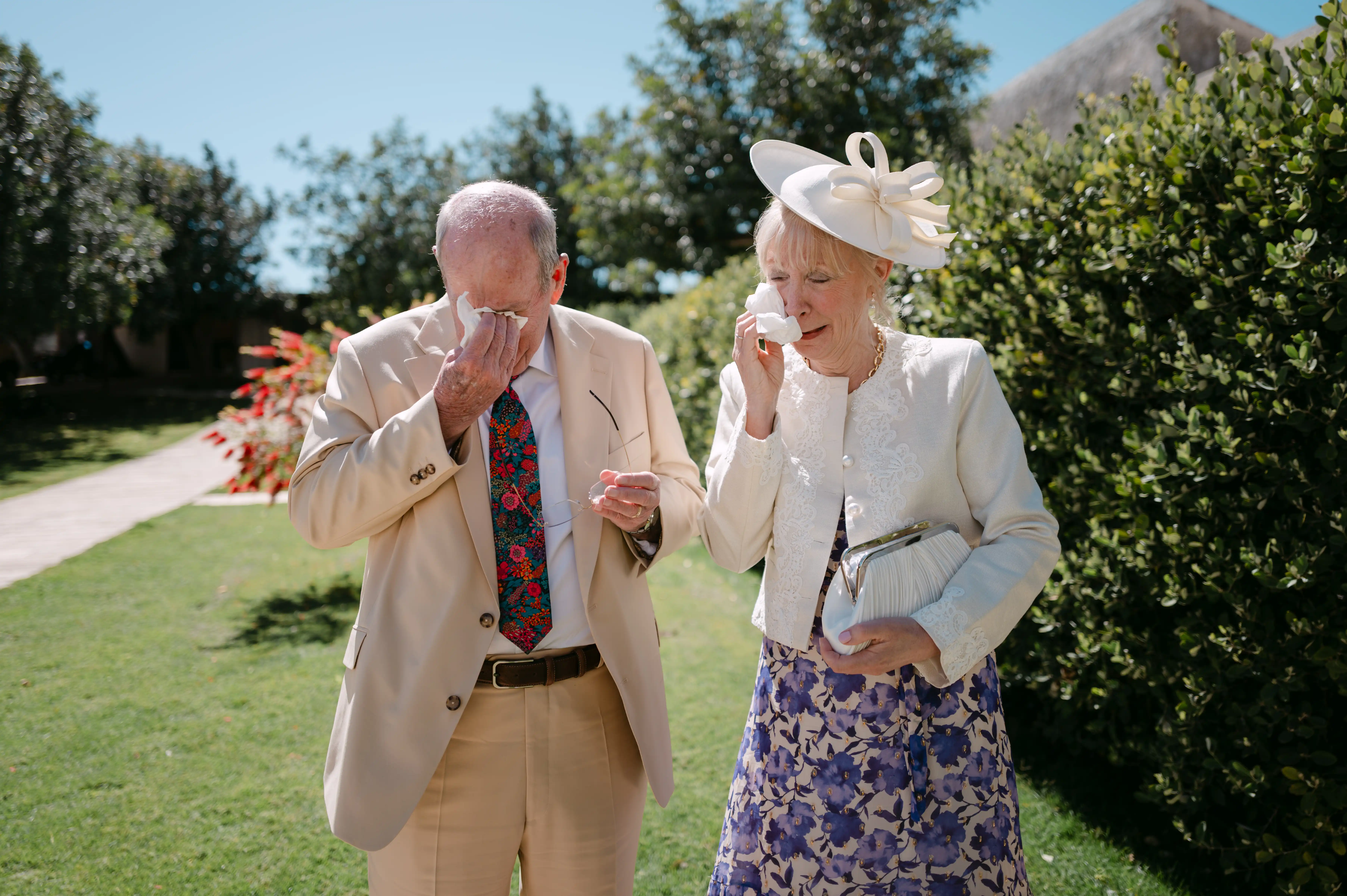 Emotional parents crying during luxury destination wedding ceremony in Sicily